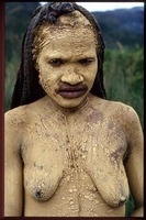 A young woman in mourning for dead husband, Baliem Valley, West Papua for Indonesia, A Journey Through the Archpelago